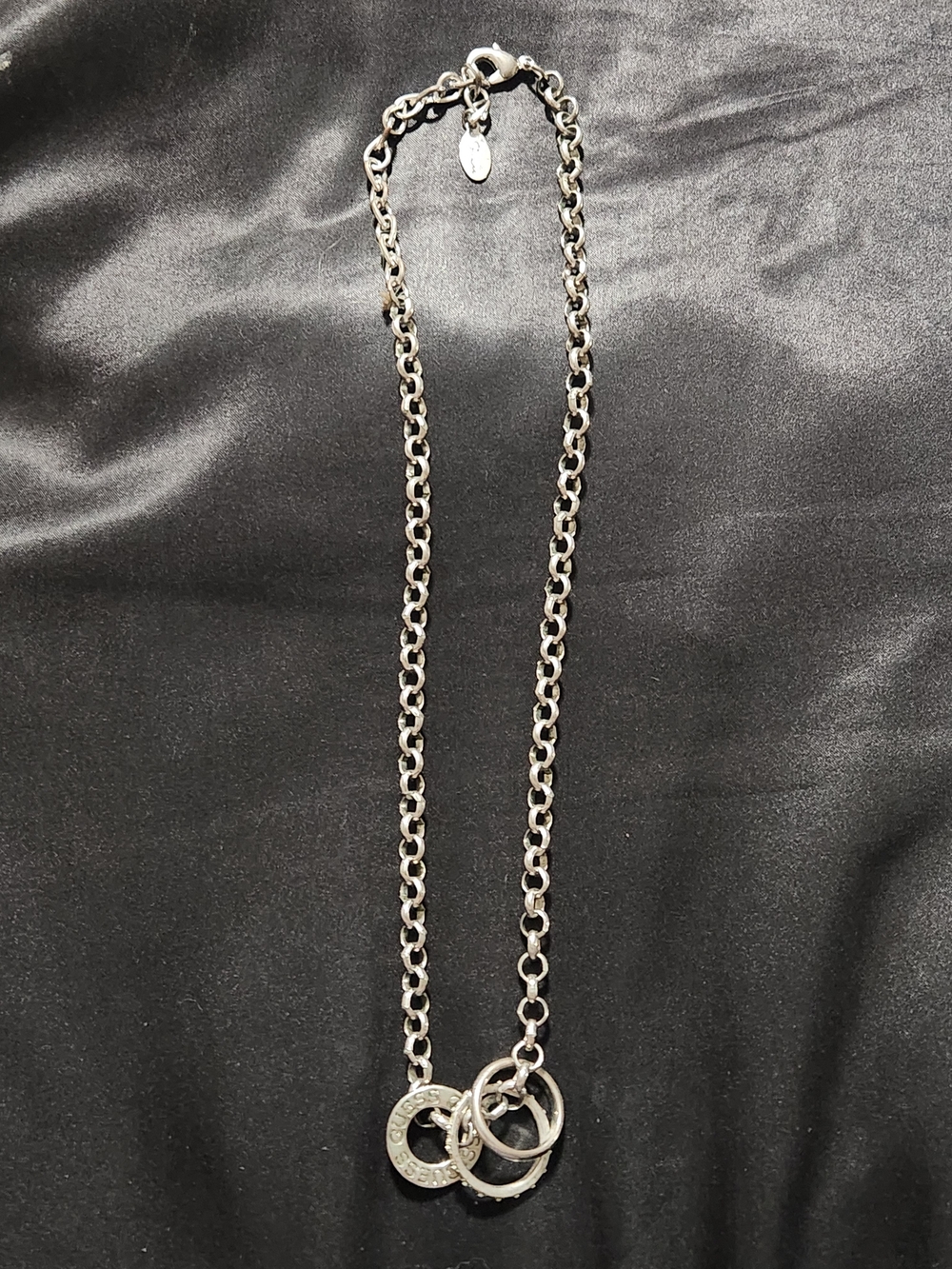 GUESS Silver Tone Interlocking Ring Pendant Necklace Rhinestone Rolo Chain